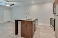 115 W Jones St, Unit 105 in Krum, TX - Building Photo - Building Photo