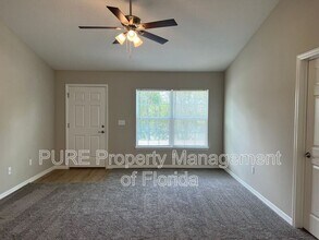 309 Malauka Run in Ocklawaha, FL - Building Photo - Building Photo