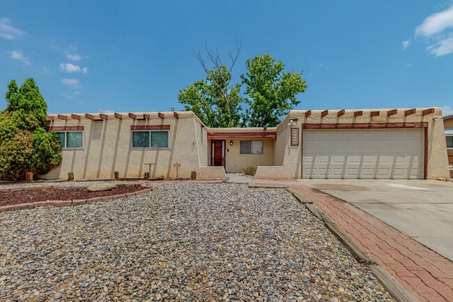 property at 7309 Coulson Dr NE