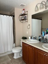 Avalon Park corner end Townhome featuring  in Orlando, FL - Building Photo - Building Photo