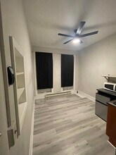 2841 N Calvert St, Unit 1F in Baltimore, MD - Foto de edificio - Building Photo