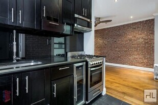 E 100TH ST., Unit 2D in New York, NY - Building Photo