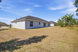 4593 SW Bradbury St in Port St. Lucie, FL - Building Photo - Building Photo