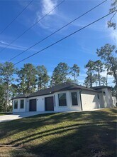 1112 East 12th Street in Lehigh Acres, FL - Foto de edificio - Building Photo