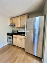 381 Dorchester St, Unit A11 in Boston, MA - Building Photo - Building Photo