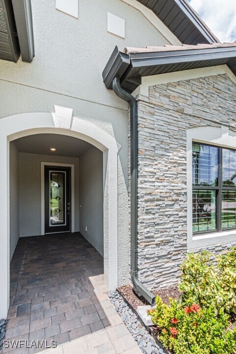 19100 Marquesa Dr in Miromar Lakes, FL - Building Photo