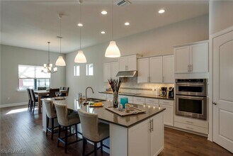 14020 Hawks Eye Ct in Estero, FL - Building Photo - Building Photo