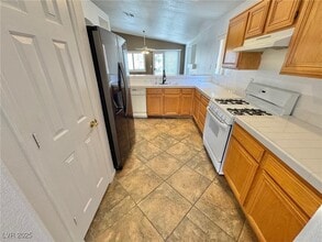 1396 Dragon Rock Dr in Henderson, NV - Building Photo - Building Photo