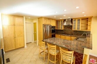 17097 Palisades Cir in Los Angeles, CA - Building Photo - Building Photo