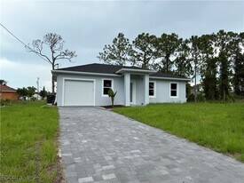 1037 Macy St E in Lehigh Acres, FL - Building Photo