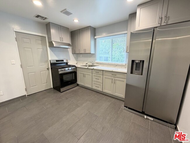 property at 15746 Magnolia Blvd