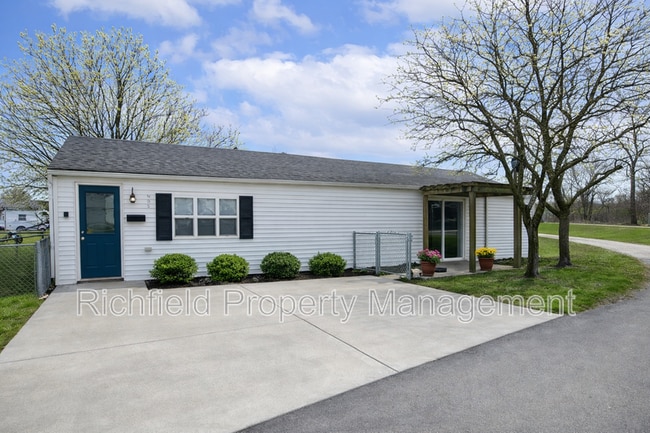 property at 405 W 3rd St