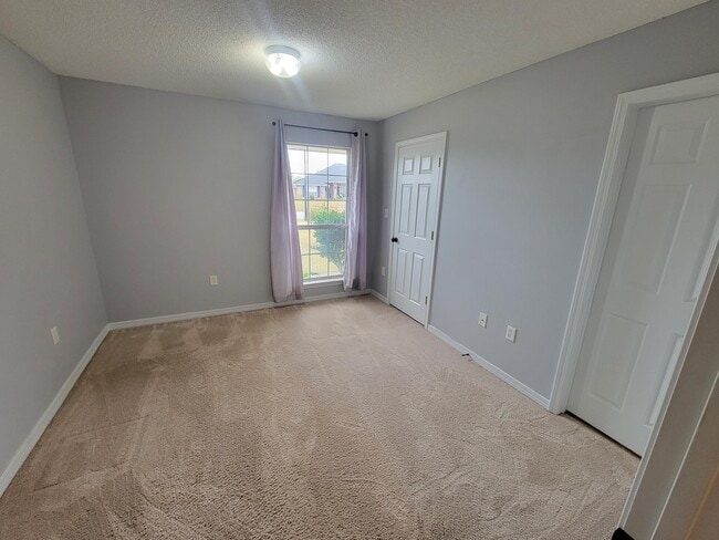 9780 Parker Lake Cir in Navarre, FL - Building Photo - Building Photo