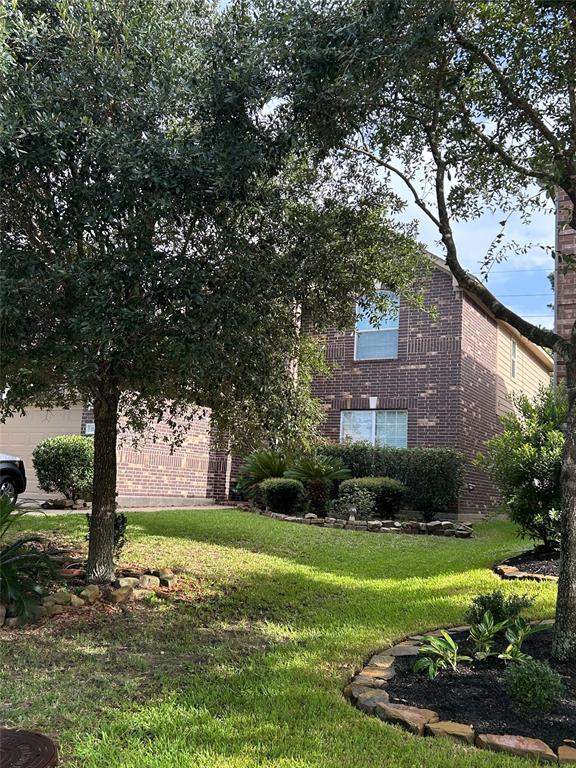 115 N Hawkhurst Cir in Magnolia, TX - Building Photo - Building Photo