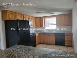 10015 Regency Park Blvd in Port Richey, FL - Building Photo - Building Photo