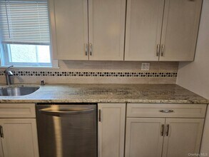 125 Roslyn Rd in Mineola, NY - Building Photo - Building Photo