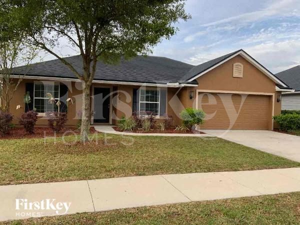 property at 9720 Woodstone Mill