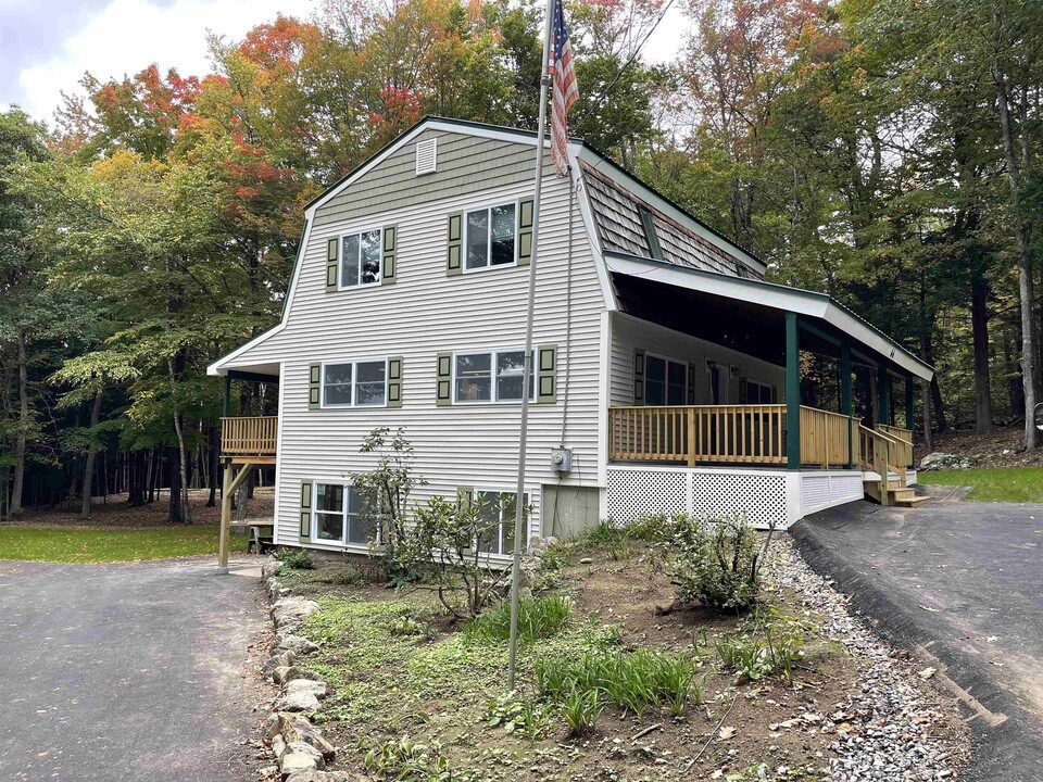 66 Saltmarsh Pond Rd in Gilford, NH - Building Photo