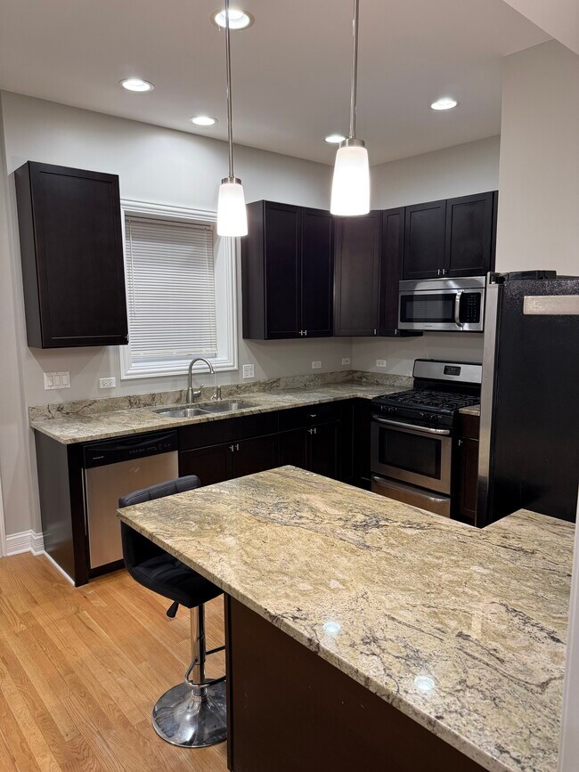 2446 N Campbell Ave, Unit 1