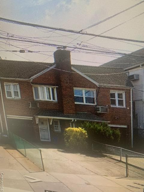 property at 57-11 Lawrence St