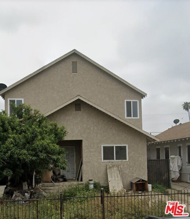 152 W 77th St in Los Angeles, CA - Building Photo