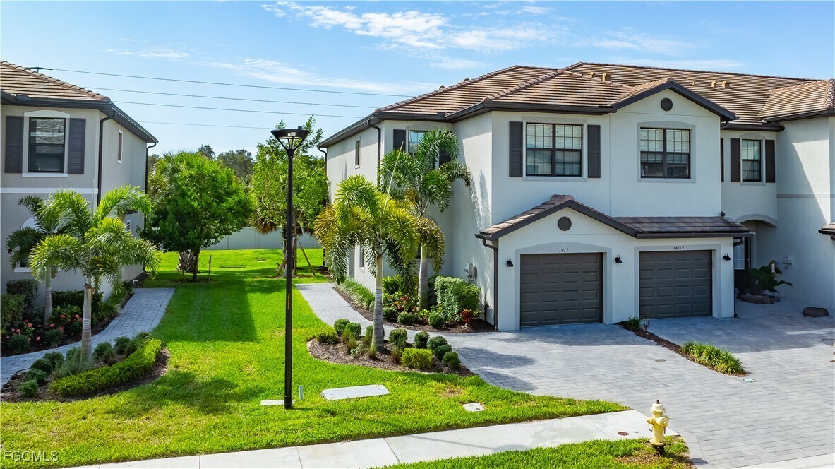 14121 Pine Lodge Ln in Miromar Lakes, FL - Building Photo