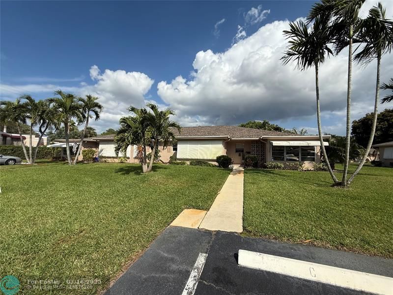 1397 High Point Way in Delray Beach, FL - Foto de edificio