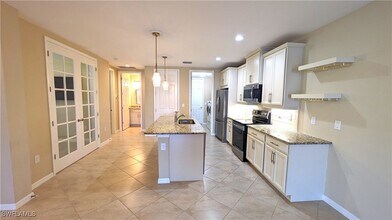 14822 Edgewater Cir in Naples, FL - Building Photo - Building Photo
