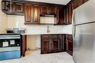 100 Wingarden Ct in Toronto, ON - Building Photo - Building Photo