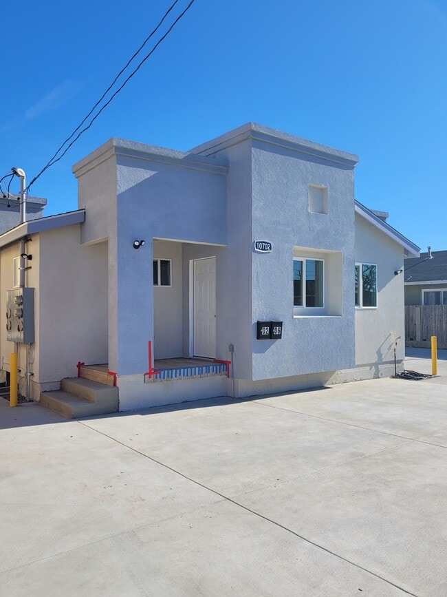 property at 10702 S Grevillea Ave