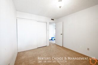 Downtown Condo Complex with Gym, Elevator & Parkade in Lethbridge, AB - Building Photo - Building Photo