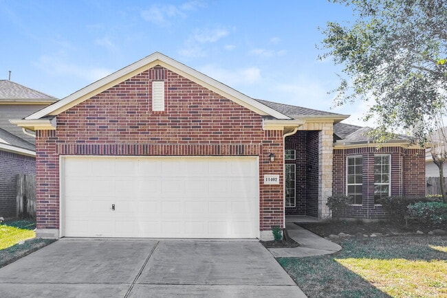 property at 11402 English Rose Trail