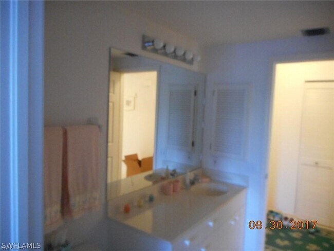 property at 6770 Pelican Bay Blvd