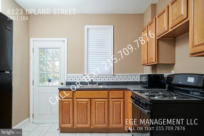 property at 6123 Upland St