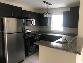 4088 N Pine Island Rd, Unit 400 in Sunrise, FL - Building Photo - Building Photo