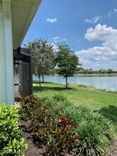 14631 Edgewater Cir in Naples, FL - Building Photo - Building Photo