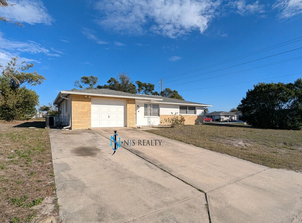 10516 Cymbid Dr in Port Richey, FL - Building Photo