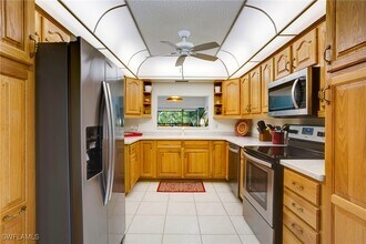 15400 Cedarwood Ln in Naples, FL - Foto de edificio - Building Photo