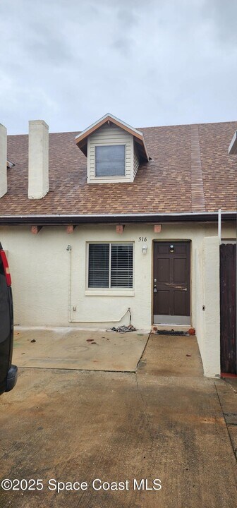 516 Harrison Ave in Cape Canaveral, FL - Building Photo