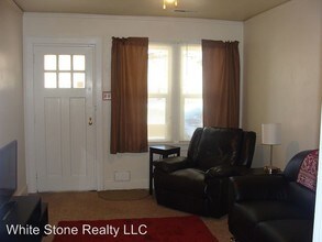 309 9th St in Rawlins, WY - Foto de edificio - Building Photo