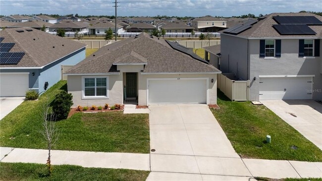 628 Talisi Lp in St. Cloud, FL - Foto de edificio - Building Photo