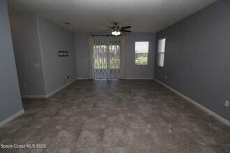 884 Musgrass Cir in West Melbourne, FL - Building Photo - Building Photo