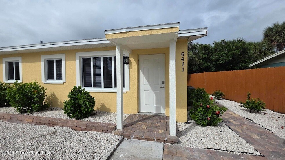 6411 Ridgewood Ave in Cocoa Beach, FL - Building Photo