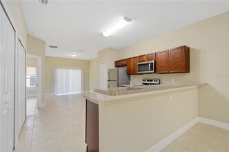 411 Blackbird Way in Poinciana, FL - Building Photo - Building Photo