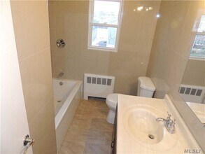 51 Baisley Ave in East Rockaway, NY - Building Photo - Building Photo