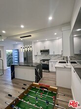 8854 Cashio St in Los Angeles, CA - Building Photo - Building Photo