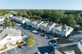 Village Estates in Amityville, NY - Building Photo - Building Photo
