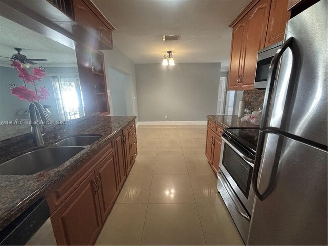 property at 6881 SW 6th St