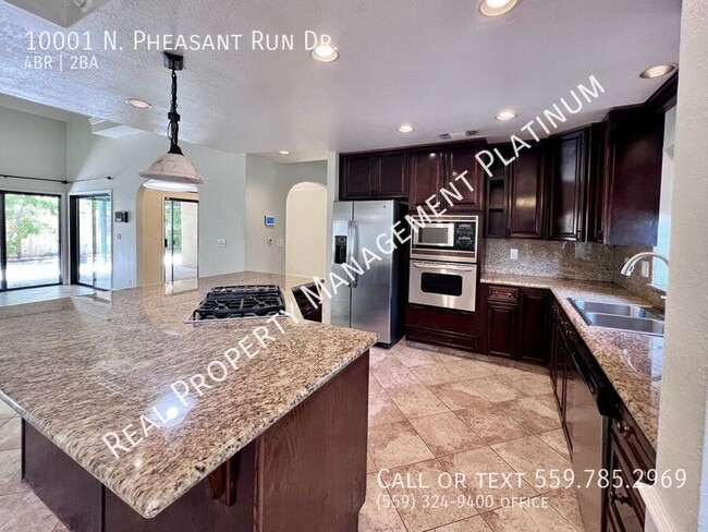 10001 N Pheasant Run Dr in Fresno, CA - Building Photo - Building Photo
