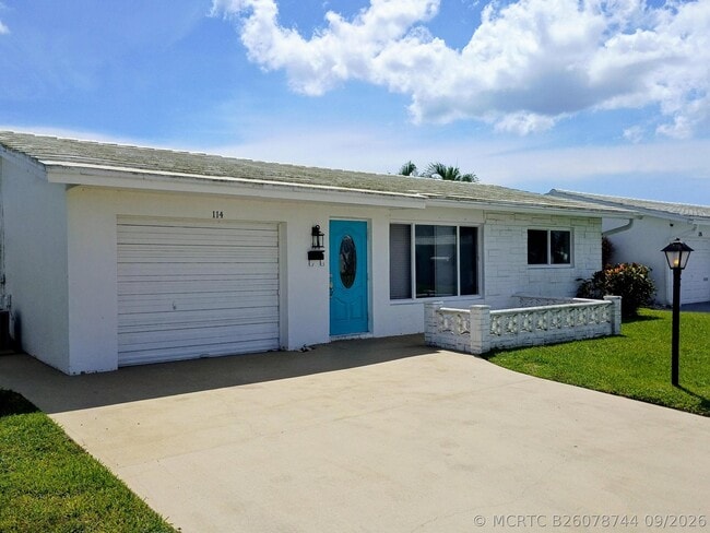 property at 114 SW 10th St